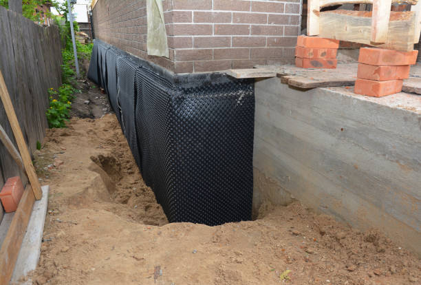 SJ Waterproofing Pros technician performing targeted Waterproofing assessment in Avon, MN